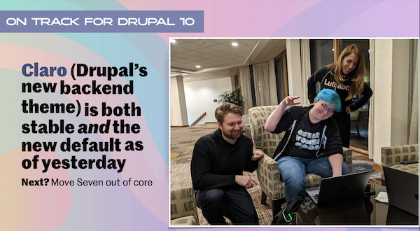 ホテルの一角にてコミッター webchick が大げさな動作で Claro の変更をコミットしている風景